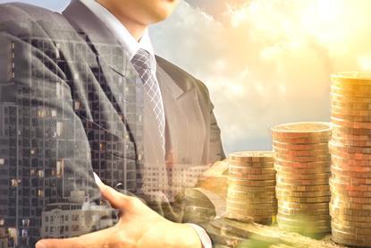 Businessman and stack coins and building shadow success business financial and tax season under the sky and sunlight